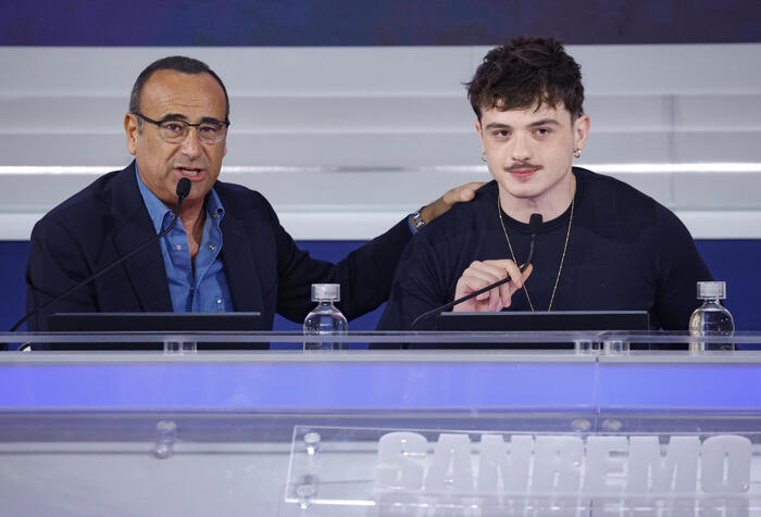 Festival di Sanremo: record storico di ascolti, Conti conduttore anche nel 2026? “Penso di sì”. Olly sull’Eurovision: “Devo pensarci”
